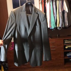 Versace suit and pants. Never worn